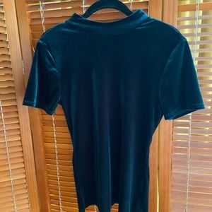 Green velvet turtle neck